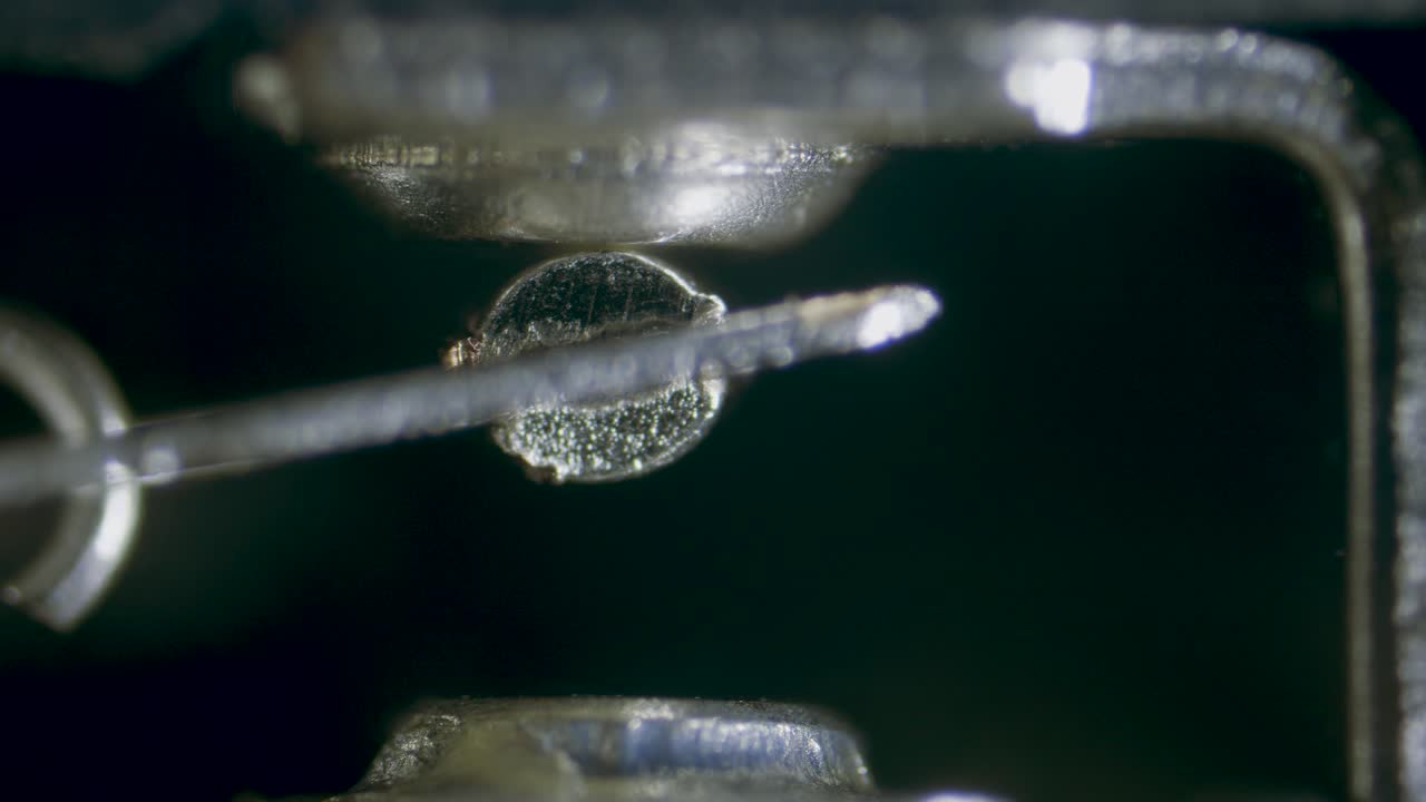 Endstop limit switch internal view in action under microscope