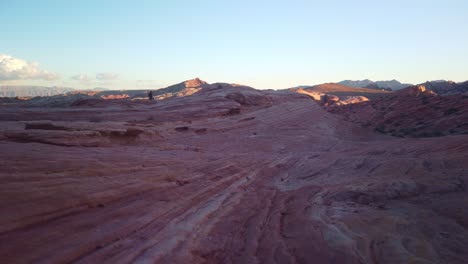 Gimbal-shot-of-the-swirling-striped-striations-of-the-sandstone-Fire-Wave-in-Valley-of-Fire,-Nevada