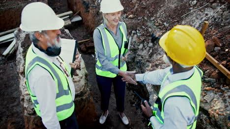 construction workers collaborating on site