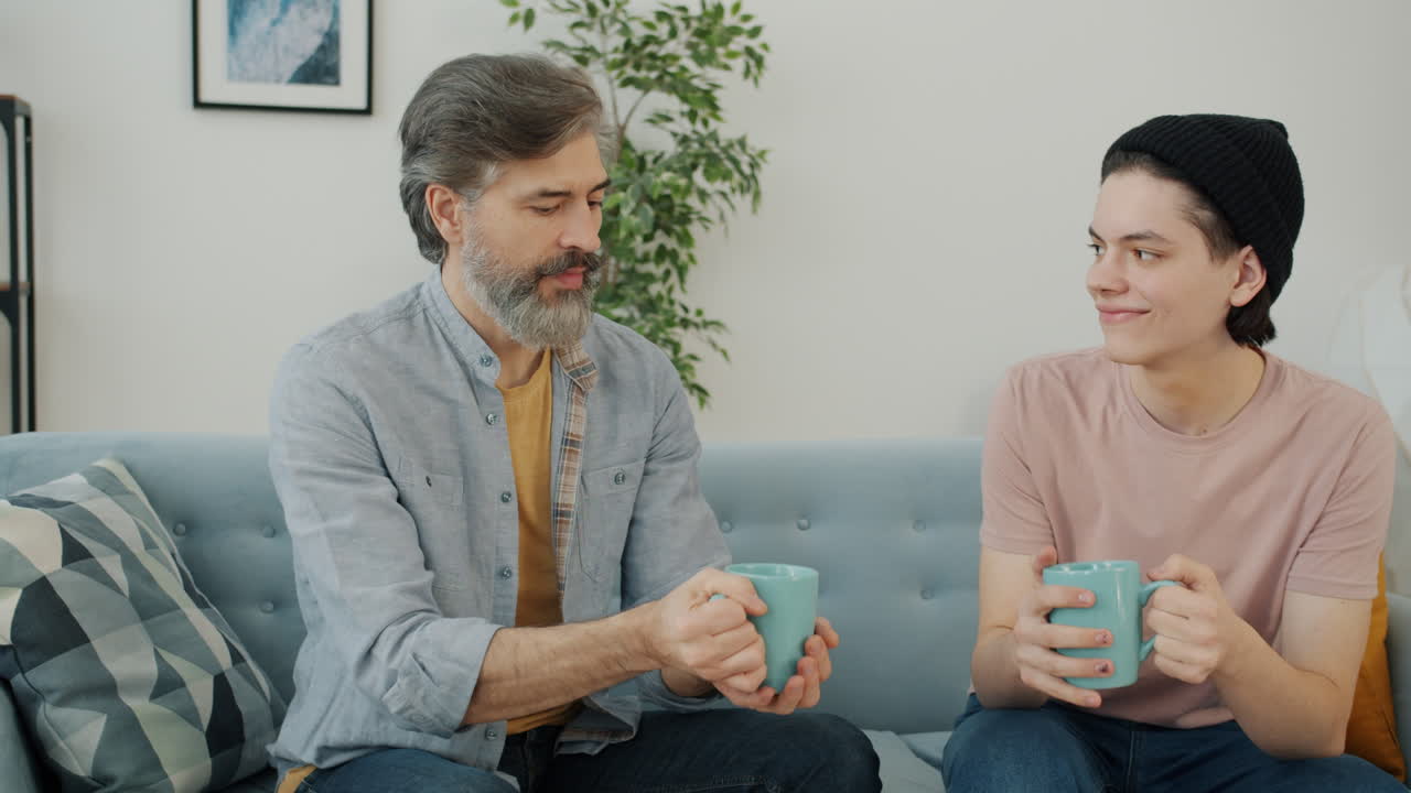 Father and Son Enjoying Coffee Together