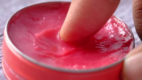 applying lip balm