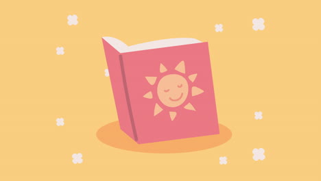 pink book with a smiling sun illustration