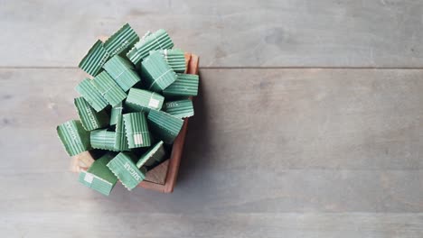 sugar packets in wooden box