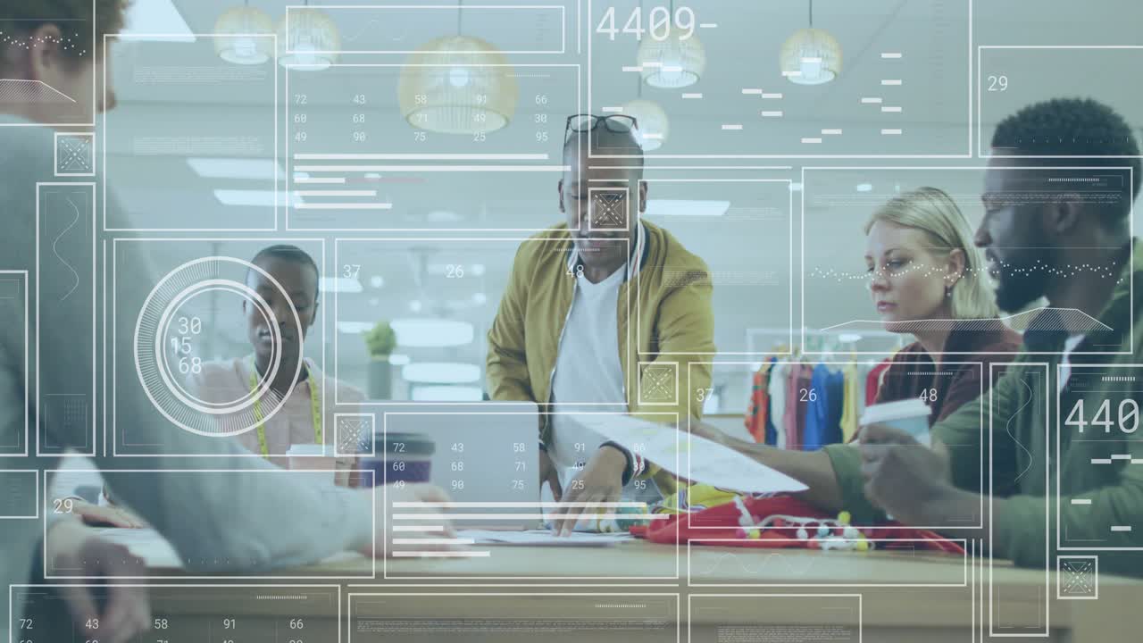 Man in yellow jacket standing, sorting pages, leading team for fabric review, HUD overlay scrolling