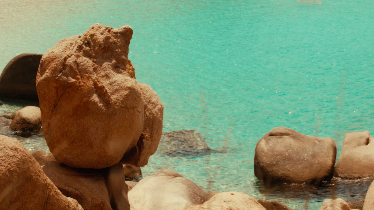Tropical Beach with Turquoise Water and Rocks