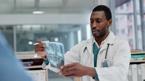 black man, doctor and x ray of patient