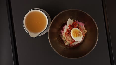 chilled chewy noodles with savory pollock and a zesty seasoning. 고소한 명태와 새콤한 양념이 조화로운 차가운 쫄깃한 면.