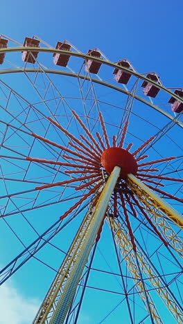 ferris wheel on amusement park vertical video