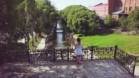 canal view with love locks bridge