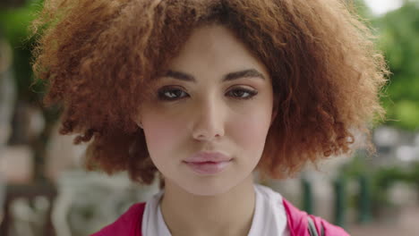 close-up-portrait-of-cute-young-teenage-student-girl-looking-at-camera-beautiful-woman-with-afro-perfect-skin