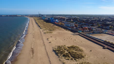 great yarmouth port, england. rising shot showing the port, residential areas, some empty amusements, the waterfront, and houses along the norfolk coastline in a quiet, historical industrial setting