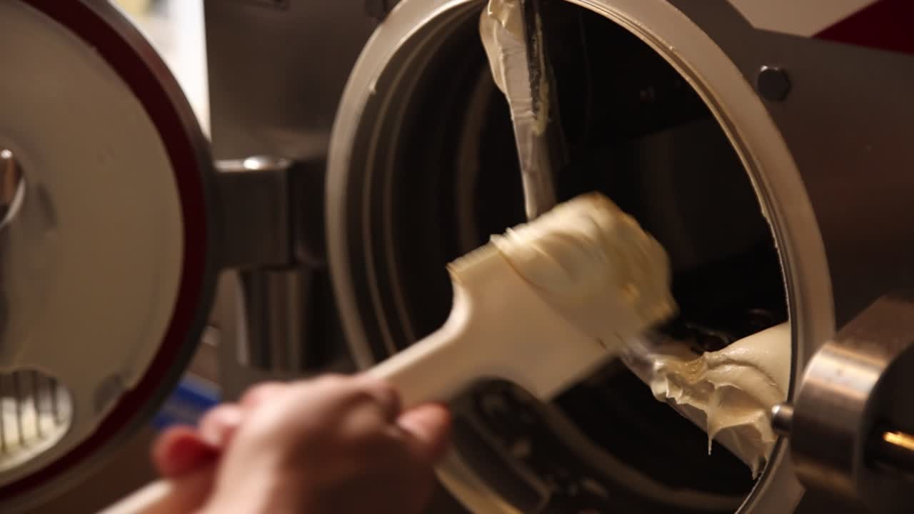 Chef Scrapes Freshly Made Ice Cream from Commercial Machine