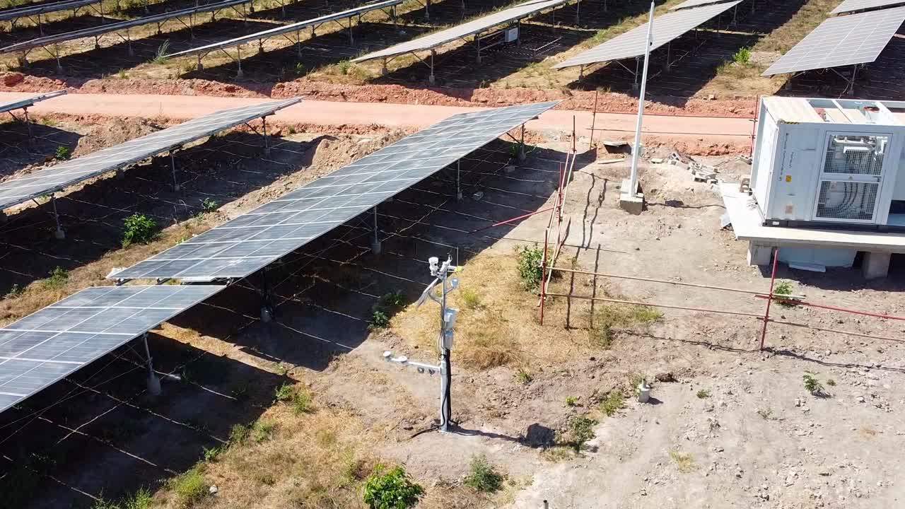 Modern solar powered weather station and inverter at PV power point