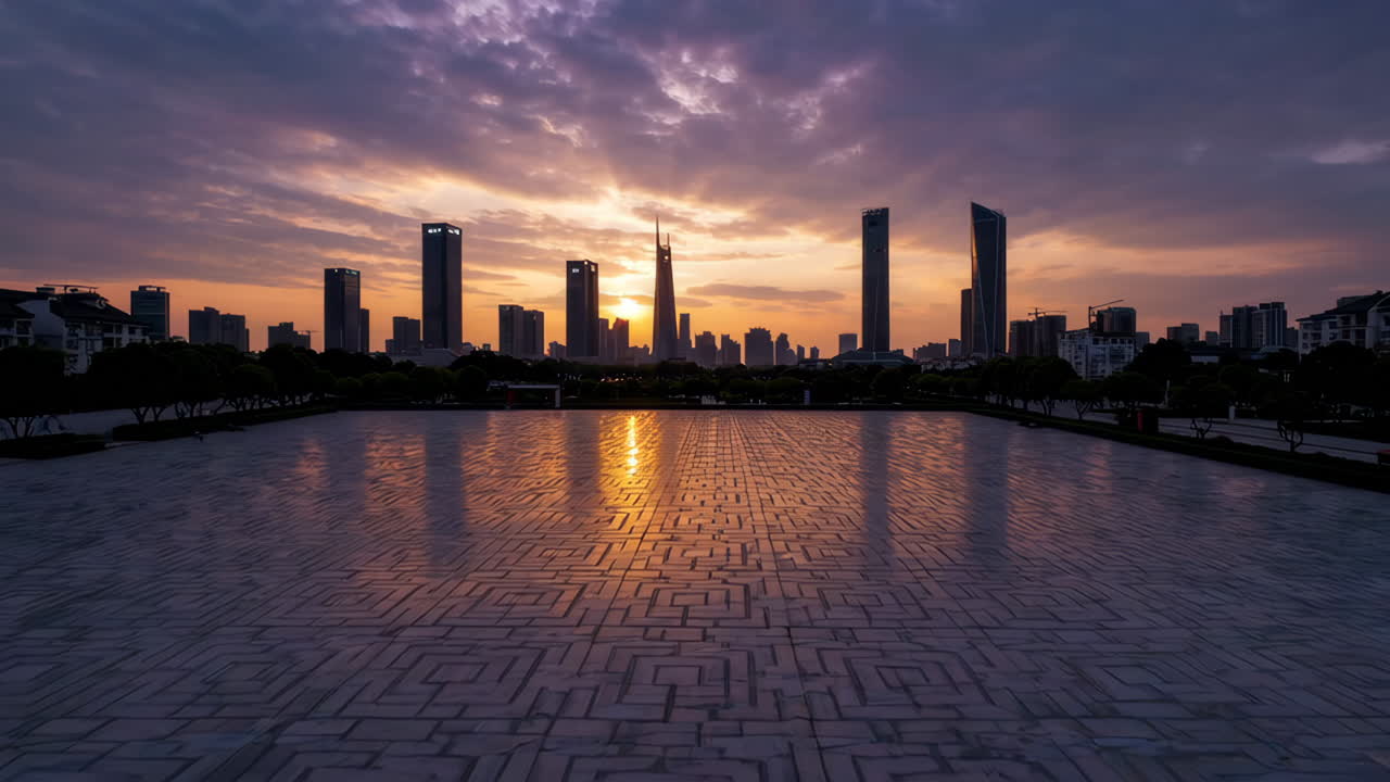 City Skyline at Sunset with Reflecting Light on Paved Square