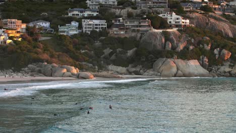 surfers waiting to catch a wave