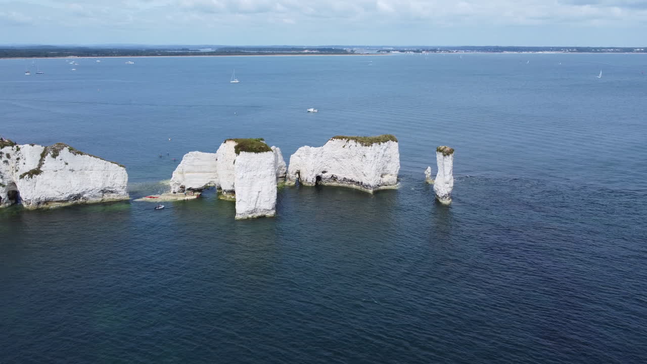 Old Harry Rocks Sea Stacks Cliff and Poole Bay Aerial Orbit