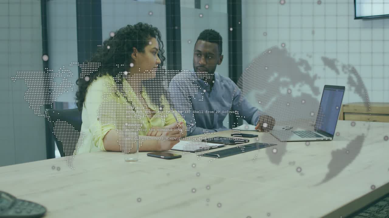 Colleagues leaning, man pointing at laptop starting review, business dotted globe overlaying front