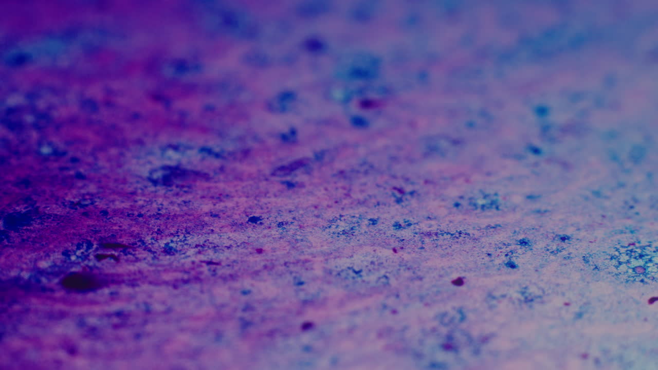 Colourful, organic, liquids macro shots buzzing and flowing