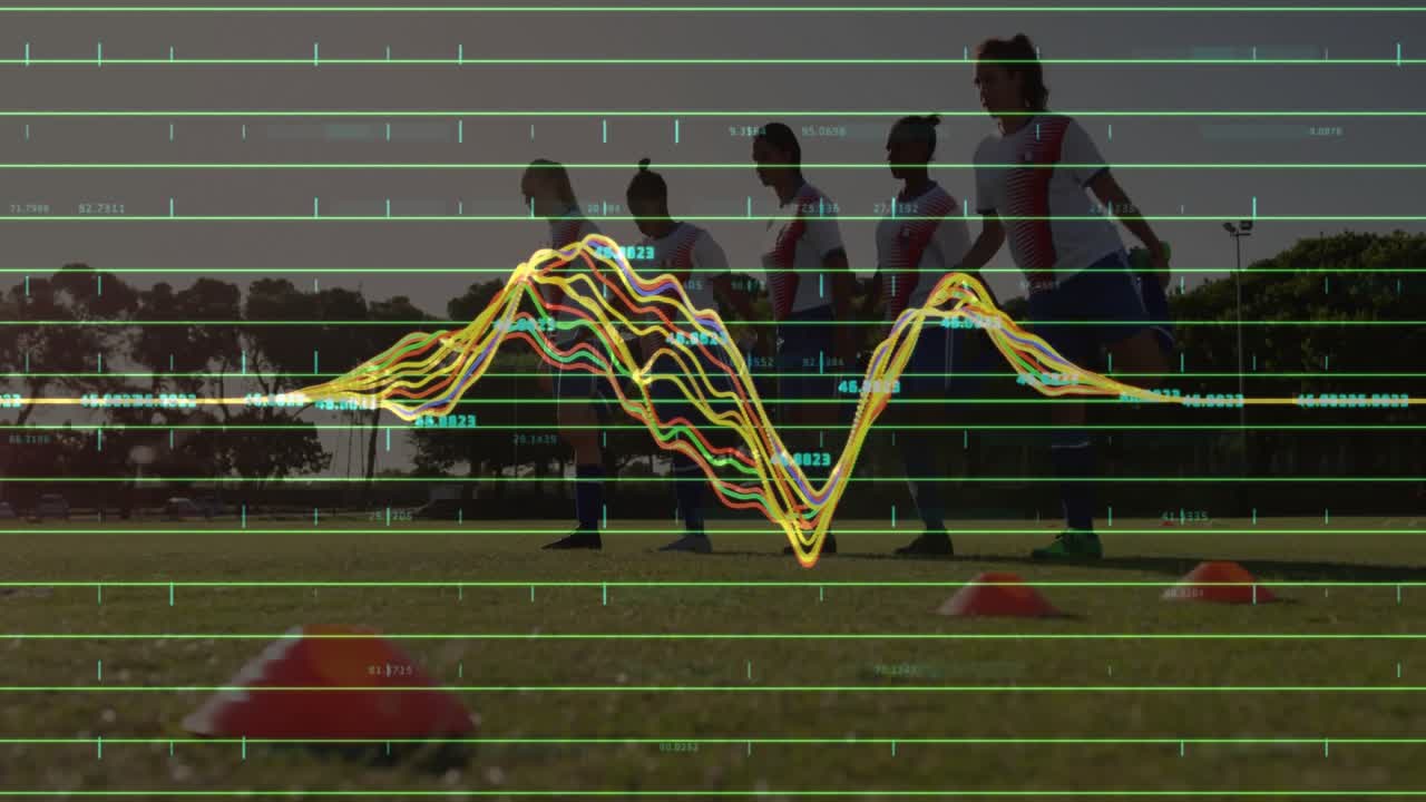 Soccer players on field receiving start signal, performing drill with waveform tracking performance