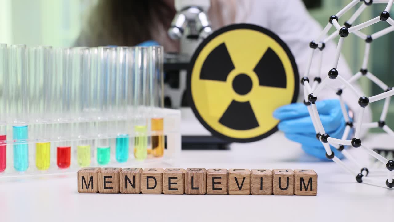 Mendelevium Chemical Element in a Science Lab with Radiation Symbol