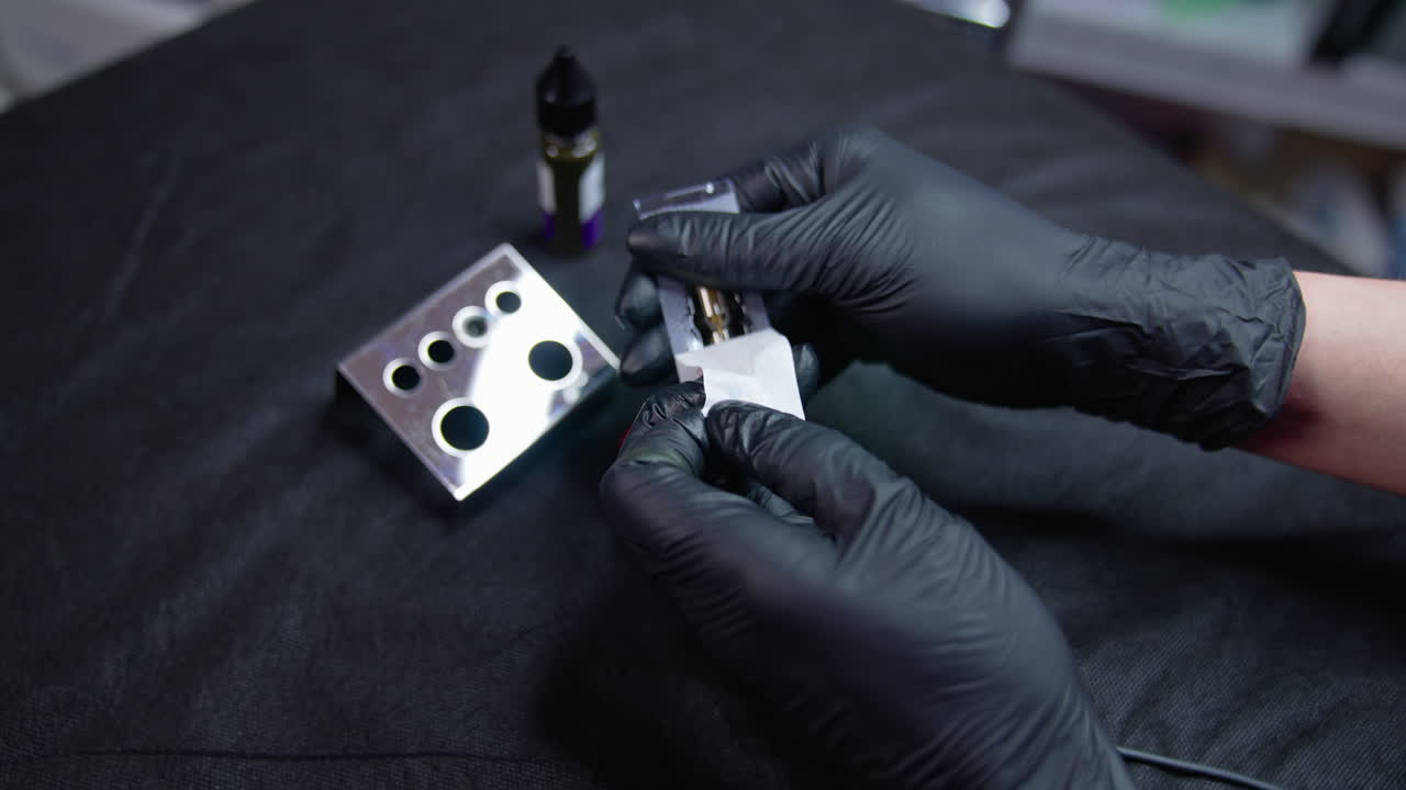 Preparing for tattoo. Unpacking new needle for eyebrow tatoo