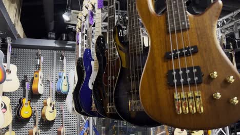 classical guitars in a musical instrument store. many musical instruments. the concept of instrumental music