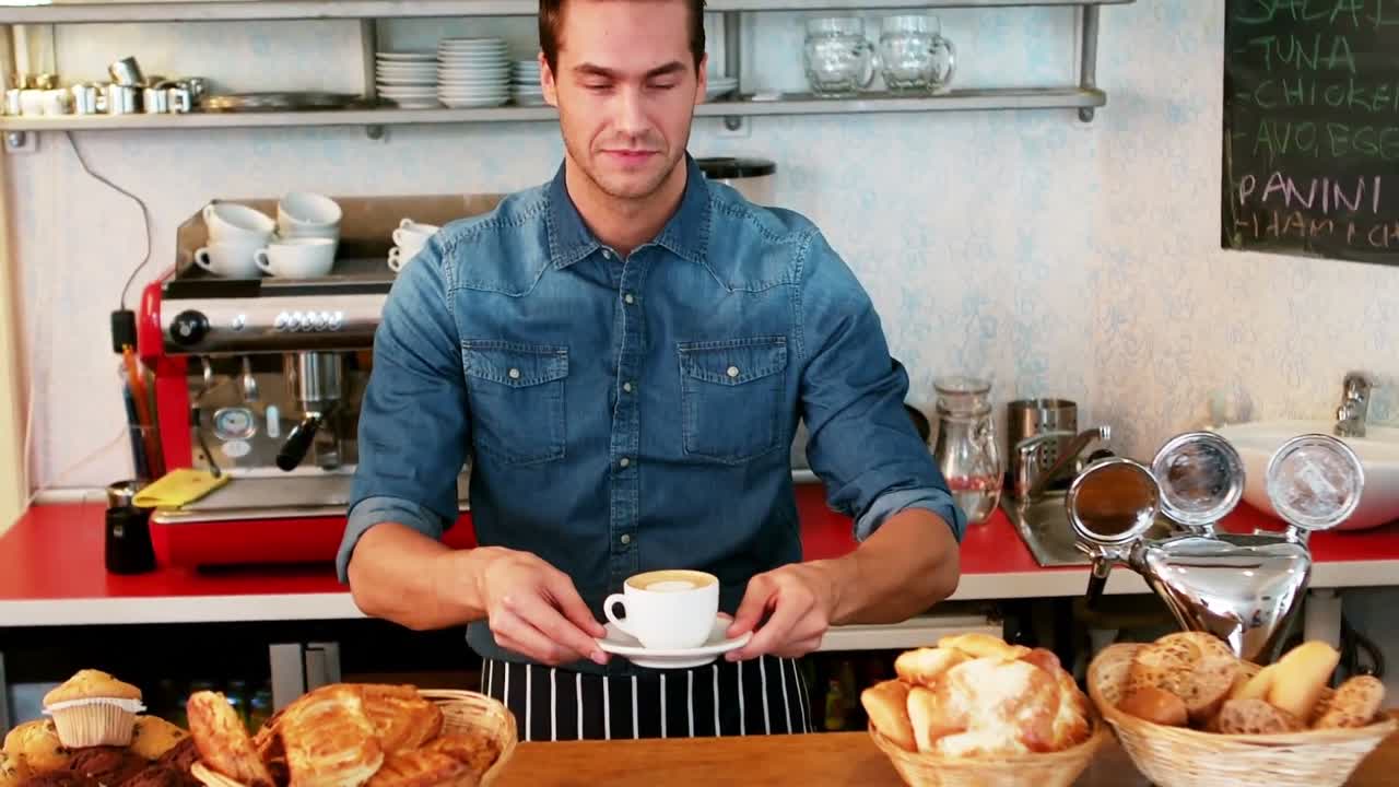 카운터에서 커피 한 잔을 제공하는 웨이터의 초상화