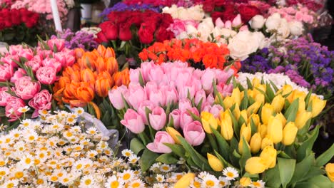 colorful flower arrangements for sale at a market