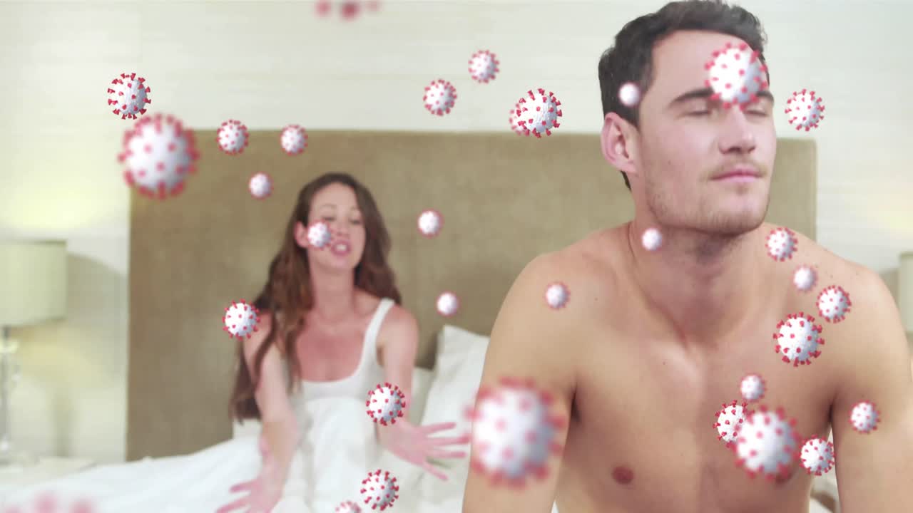코로나19 세포가 침대에서 싸우는 커플을 상대로 움직이는 디지털 복합 비디오