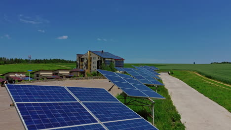 row of solar cells on green grass. photovoltaic panels to generate clean energy in the countryside. solar power station in nature.