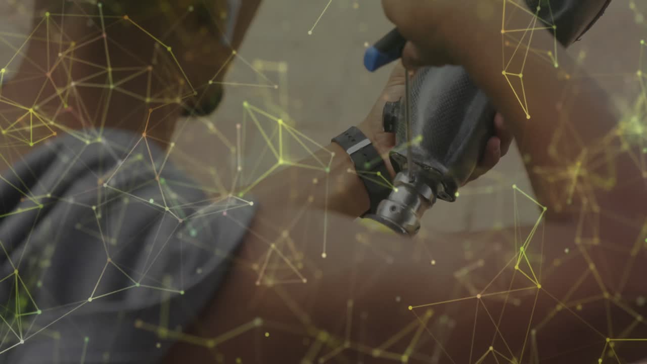 animación de la red amarilla sobre un atleta masculino preparando una pierna protésica para hacer ejercicio al aire libre