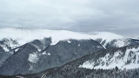 thick snow-covered mountain peaks at colorado winter park
