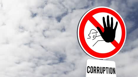 Signboard-post-with-stop-corruption-text-against-clouds-in-the-blue-sky