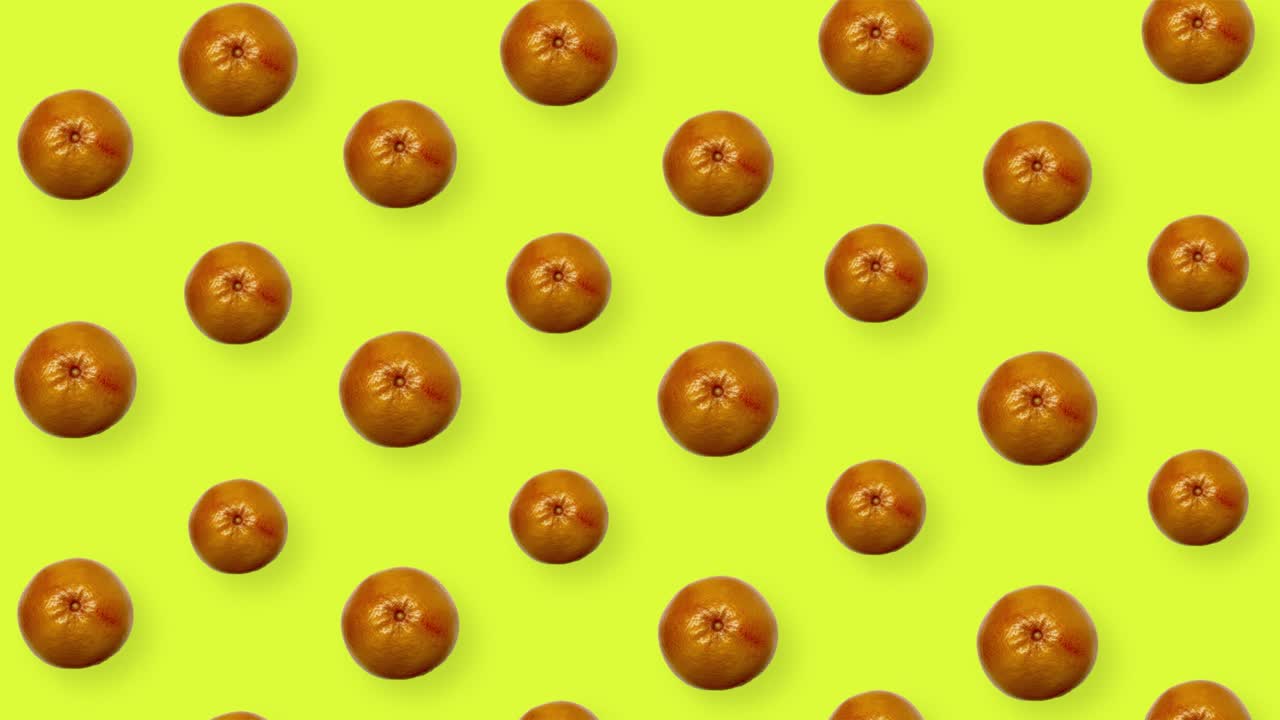 patrón de frutas coloridas de pomelos frescos en fondo amarillo. patrón sin costuras con pomelos. animación realista. movimiento de video 4k