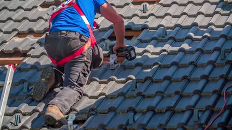 Roofer-building-solar-panel-construction-on-sunny-day