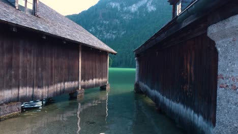 Wooden-houses-built-on-the-shore-of-the-King's-Lake,-Königssee-in-Germany,-Bavaria