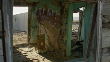 slider shot of abandoned building in desert