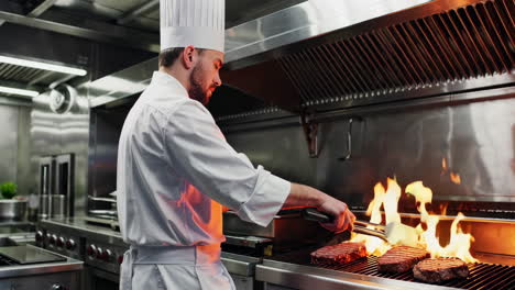 chef grilling steaks in a restaurant kitchen