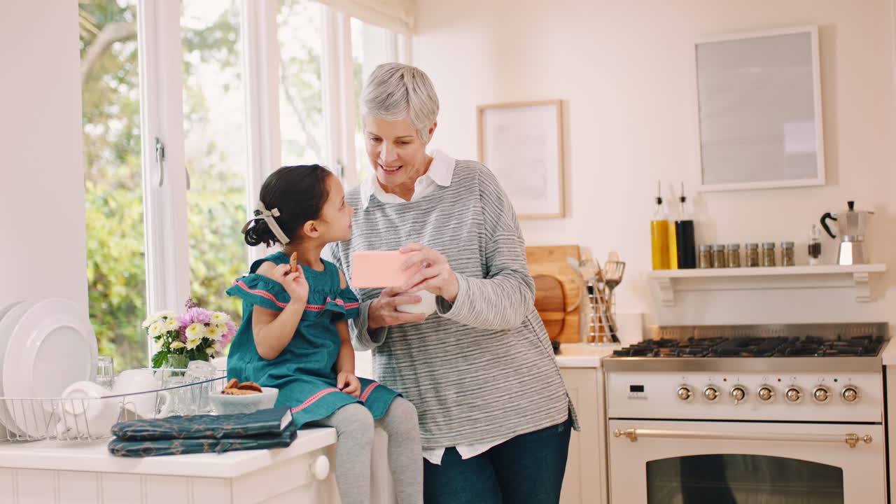 Grandmother, kid and video call with phone