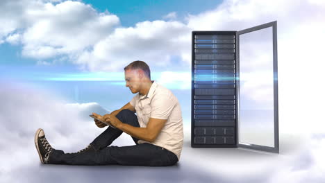 Casual-man-using-his-smartphone-in-front-of-server-tower-