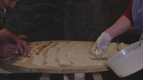 Women-Making-The-Popular-Georgian-Dumplings-Stuffed-With-Meat-And-Cheese