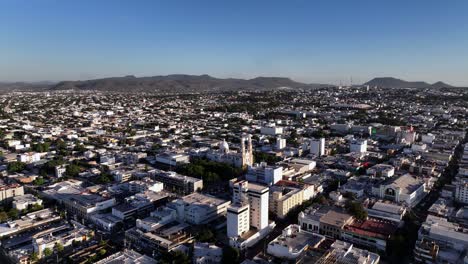 aerial view towards the cathedral in culiacan rosales, golden hour in sinaloa, mexico