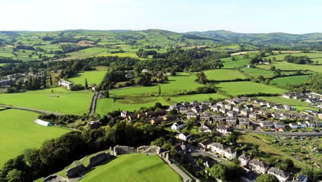 denbighshire residential suburban north wales countryside righ pan across housing estate aerial view