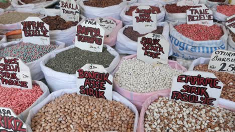 various types of beans and seeds for sale at a street market in turkey