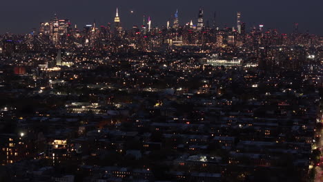 aerial view of the new york city skyline at night