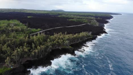 flying over the 2018 volcanic flow and the new road on top in hawaii's puna district