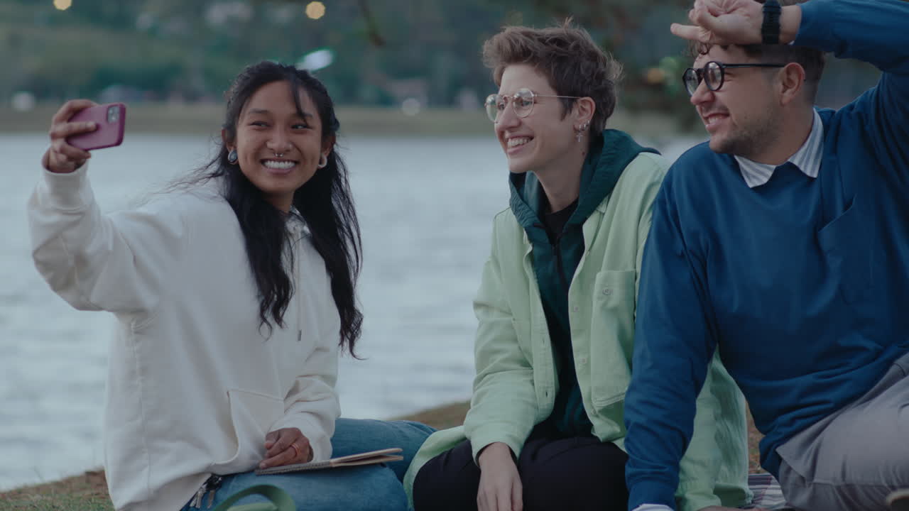 College Friends Taking Photos in the Park