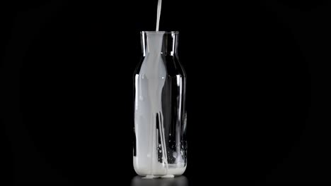 milk being poured into glass bottles sequentially