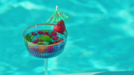 refreshing summer cocktail by the pool