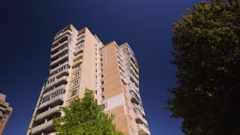 Footage-captures-a-high-rise-Russian-apartment-tower-exemplifying-communistic-Eastern-European-architecture-style,-highlighting-its-stark,-functional-design